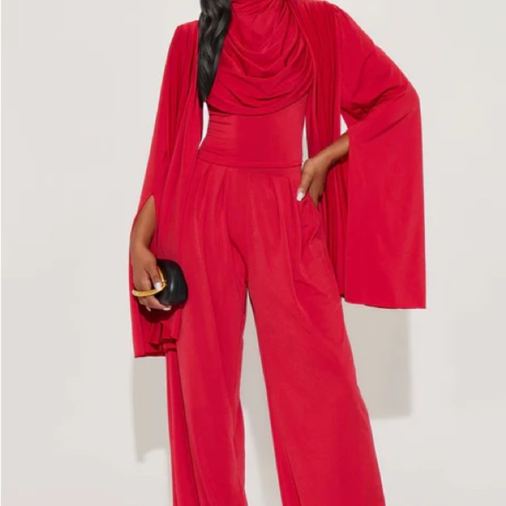 Red Wide-Leg Jumpsuit with Dramatic Cape Sleeve